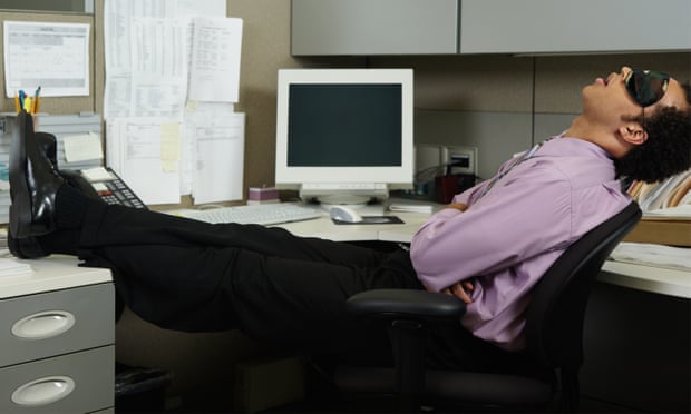 Businessman sleeping at his desk