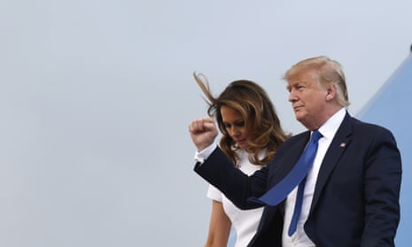 Donald Trump and his wife, Melania, disembark Air Force One. The president’s legal team has called the impeachment trial ‘unlawful’. 