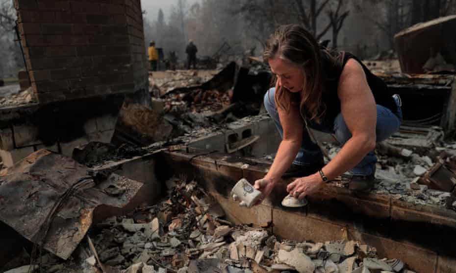Erin Hillman, a member of the Karuk Tribe, looks at ceramics damaged in her home after the Slater fire in Happy Camp, California, on 30 September 2020.