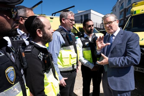 Starmer speaks to volunteers from Shomrim.