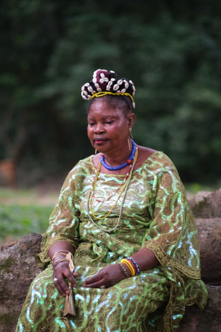 Osunnike Ogundele, one of the grove custodians.