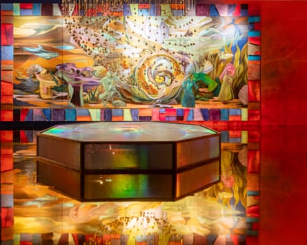 Bright swirling colours and figures with box in foreground