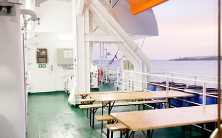 Seating and tables on one of the decks of the MV Hondius.