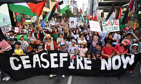 Protestors are seen during a Pro-Palestine demonstration in King George Square in Brisbane, Sunday, 12 November 2023.