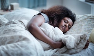 Woman sleeping in bed