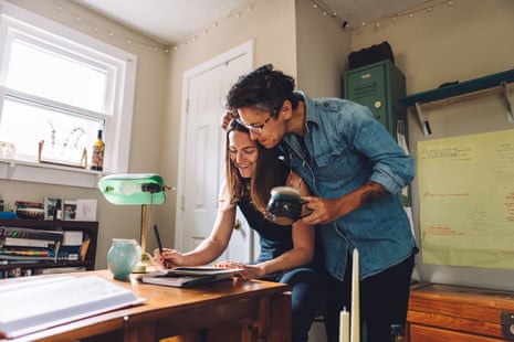 A couple sharing an intimate moment during paperwork