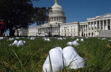 National Nurses United (NNU) display 164 white clogs shoes outside the US Capitol to honor the nurses who have lost their lives from Covid-19 in the US.