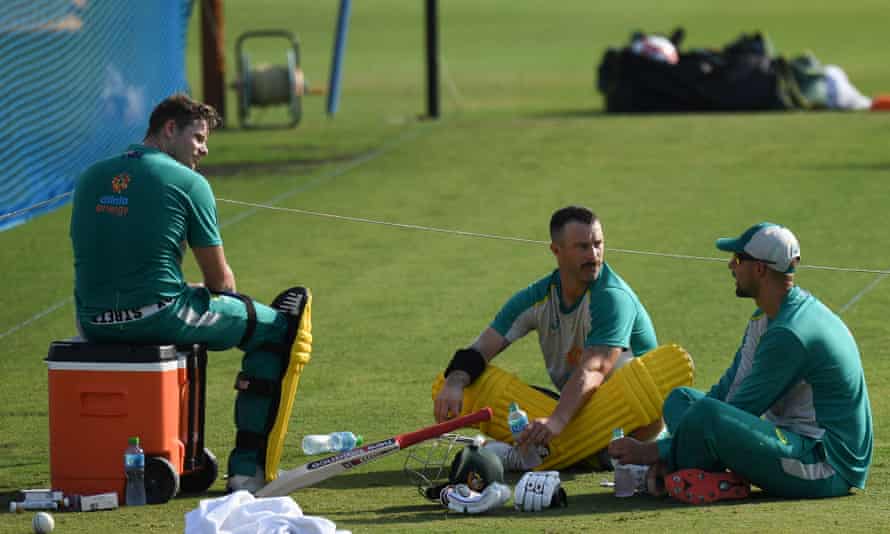 Steven Smith, left, Matthew Wade, centre, and Ashton Agar take a rest during Australia’s practice session at the ICC Academy in Dubai on Saturday.