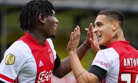 Lassina Traoré (left) of Ajax celebrates with Antony after scoring the third goal in the match against VVV Venlo in October 2020.