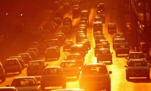 Rush hour traffic on a congested road as the sun sets in Melbourne