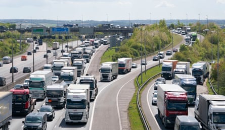 Lorries and cars queue