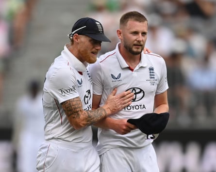 Ben Stokes with Gus Atkinson of England.