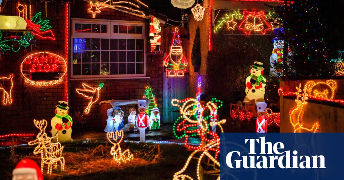 Solar large holiday bulb lights with hooks Christmas illuminations adorning homes across England – in pictures