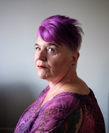 Wendy Barker standing side-on looking at the camera