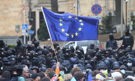 A demonstrator holds an EU flag during a rally to protest against a bill on ‘foreign agents’” in Tbilisi, Georgia, on 14 May.