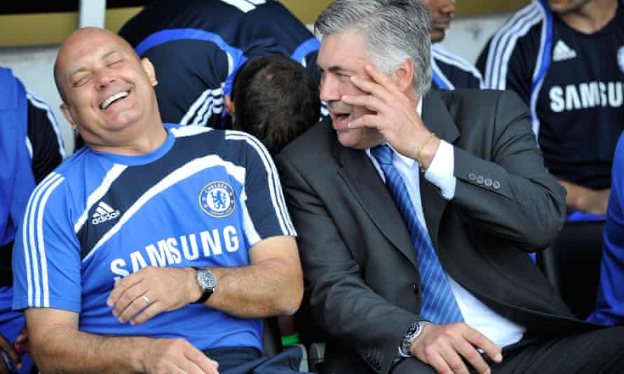 Ray Wilkins as Chelsea assistant manager, with the manager Carlo Ancelotti, at Craven Cottage before a match between Fulham and Chelsea in 2009.
