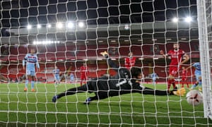 Alisson Becker lunges to his right in vain as Pablo Fornals opens the scoring.