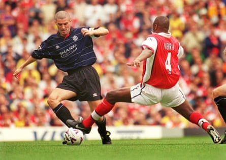 Roy Keane takes on his Arsenal adversary Patrick Vieira at Highbury