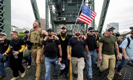 Members of the Proud Boys and other rightwing demonstrators march in Portland on 17 August 2019.