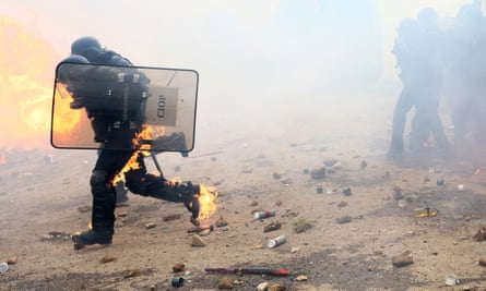 A gendarme whose clothing caught fire during the protest.