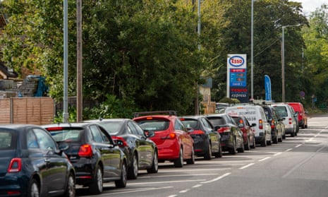 Queue of cars outside petrol station