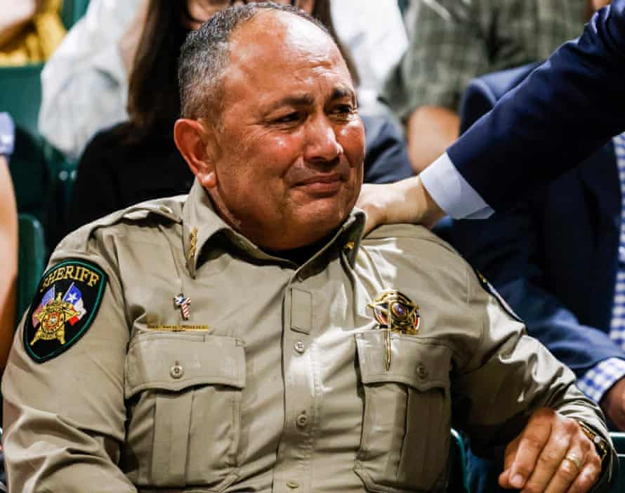 Uvalde County Sheriff Ruben Nolasco cries during a community gathering on Wednesday.