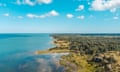 Dreamy Drone Shot Of A Estonian Island Called Muhu Looking Down On Forest And Sea And Beach<br>2JN1D2W Dreamy Drone Shot Of A Estonian Island Called Muhu Looking Down On Forest And Sea And Beach
