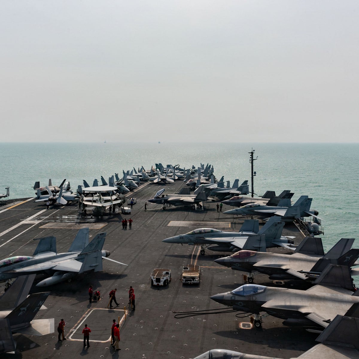 First Thing: US aircraft carrier arrives to relieve USS Lincoln amid reports of poor living conditions | US news | The Guardian