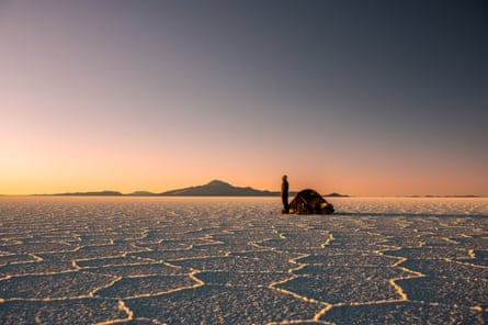 The sun sets over the Salar de Uyuni saltflats in Bolivia.