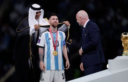 Tamim al-Thani puts a bisht on Lionel Messi after Argentina’s World Cup triumph in Qatar in 2022.