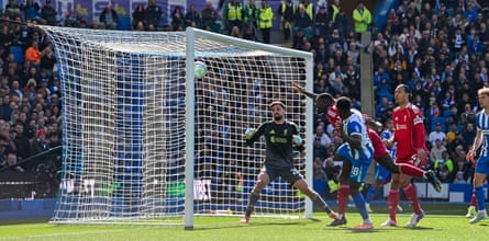 Danny Welbeck scores for Brighton against Liverpool.