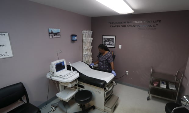 The director of clinical services, Marva Sadler, prepares the operating room at the Whole Woman's Health clinic in Fort Worth, Texas.