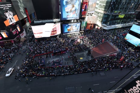People gather at Times Square during the No Kings national day of protest, in New York City on 18 October 2025.