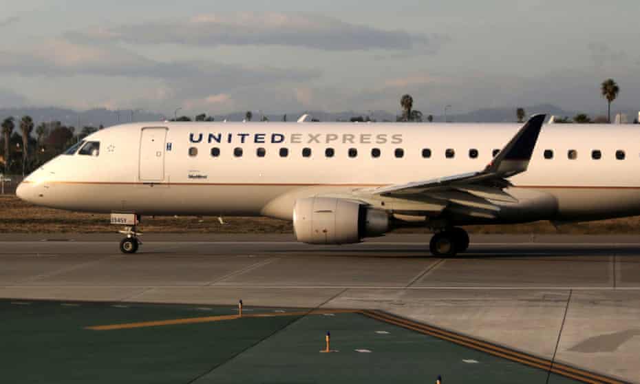A United Express plane waits to take off at LAX