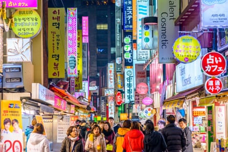 Crowds enjoy the Myeong-Dong district nightlife in Seoul.