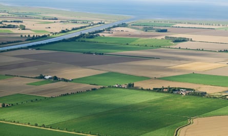 Aerial view of farmland in the UK countryside.