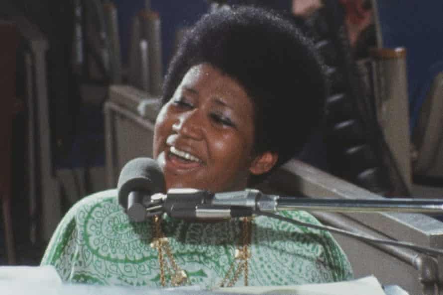 A still from the film of the Amazing Grace concert.