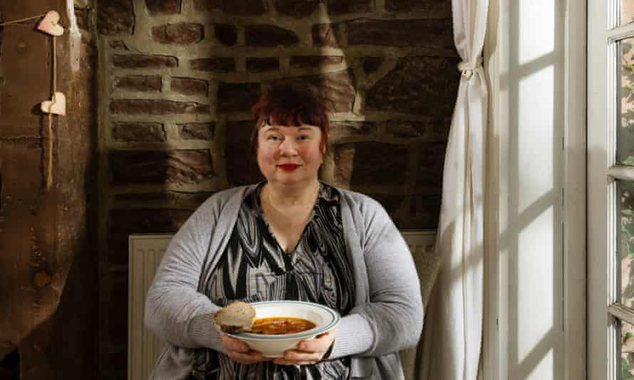 Lucy Antal holding a bowl of her goulash