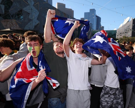 Fans At Federation Square in Melbourne watch the Socceroos