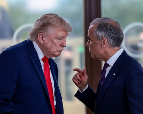 Trump listens closely as Canadian PM Mark Carney gestures while speaking