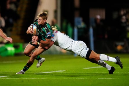 James Pater (left) is tackled by Werner Kok during the Prem match between Northampton and Newcastle.