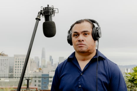 Headshot of Richie Tavake, voice actor, San Francisco, US, standing with a mic in front of him