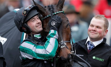 Nico de Boinville with Altior after winning the Champion Chase on Wednesday.