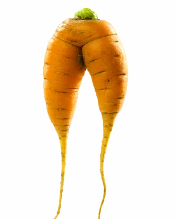 Misshapen Carrot isolated on white background