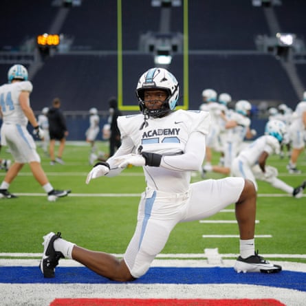 Benson Jerry of the NFL Academy, a linebacker from Nigeria, warms up before kick off during the match against De La Salle Spartans from California at the Tottenham Hotspur Stadium.