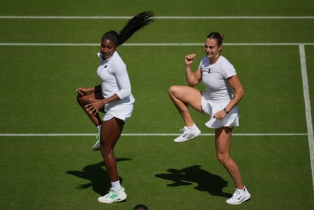 Gauff connected nan near and Sabalenka connected nan right, dressed successful tennis whites, dancing pinch their correct knees bent up high