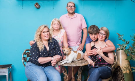 Lucy Frederick (far left), with her partner, James, his ex-wife, Emily, their children and Heston the dog