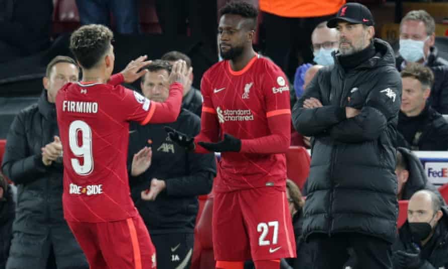 Klopp’s selection risk pays off as Liverpool move step closer to final | Champions League 2 Roberto Firmino of Liverpool shakes hands with team mate Divock Origi as he is substituted.