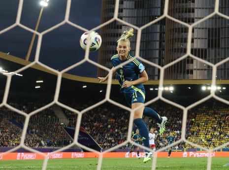 Sweden's Stina Blackstenius heads home to open the scoring against Poland.