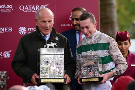 Sir Mark Prescott (left) and jockey Luke Morris after winning the Arc with Alpinista.